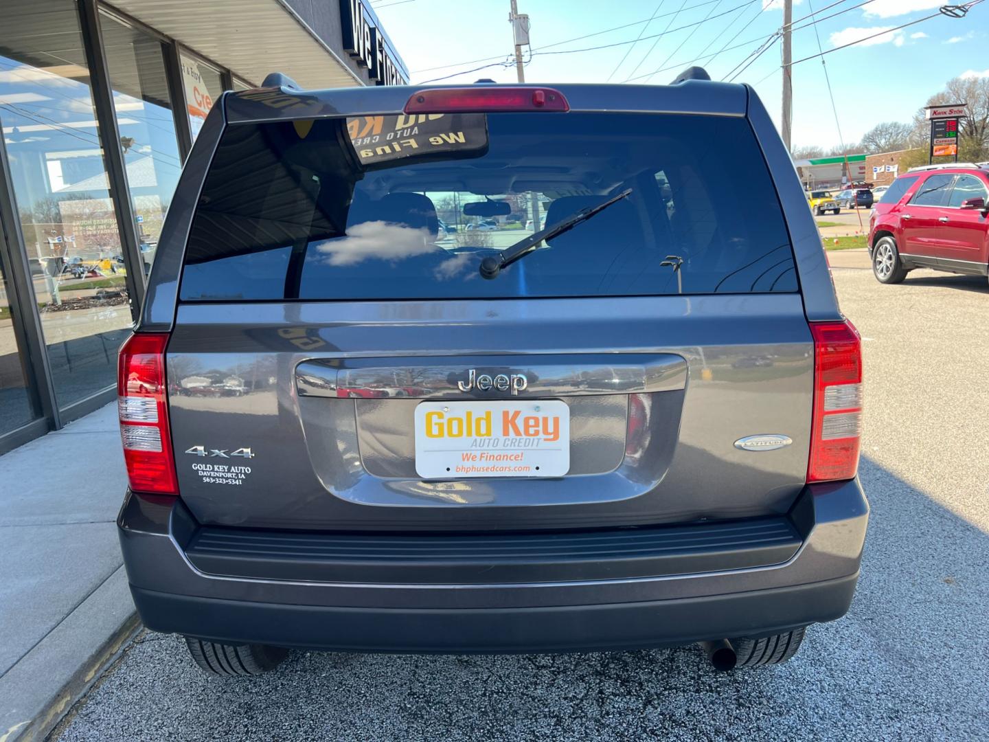 2014 Magnetic Metallic Jeep Patriot (1C4NJRFB1ED) , located at 1633 W Kimberly, Davenport, IA, 52806, (563) 323-5341, 41.559456, -90.598732 - Photo#4